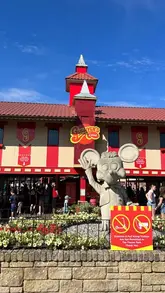 A mother and daughter enjoy a day out at Gullivers Land theme park, showcasing various rides and attractions suitable for children.