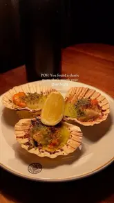 A polished, cinematic montage showcasing the 20th-anniversary classics menu at Hawksmoor, featuring close-ups of steaks, sides, and desserts.