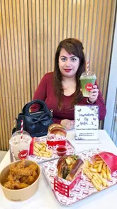 A short review video showcasing the new menu items at Loaf, including brioche sandwiches, chicken tenders, and dessert sticks, presented by a creator in a casual, handheld style.