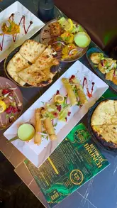 A review of the bottomless brunch at Chester's Lounge, featuring Indian tapas-style starters, sides, and free-flowing drinks.