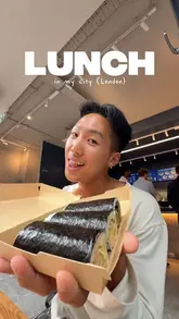 A creator visits Saltwater Sushi in Soho, London, to try 'Aussie sushi'—uncut, takeaway-style sushi rolls. He provides a personal review of the spicy salmon, spicy tuna, and chicken schnitzel rolls, commenting on the texture and spice levels.