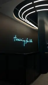 A day-in-the-life style video featuring a morning workout routine at Third Space Wimbledon, showcasing the gym floor, sauna, pool, and cold plunge facilities.