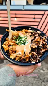 A fast-paced vlog showcasing a variety of international street food vendors at a food park in Birmingham, highlighting specific dishes and providing a top-three recommendation list.