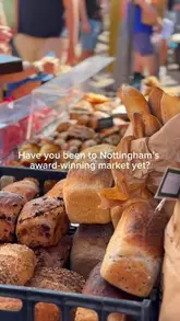 A montage showcasing various independent vendors at the Ruddington Village Market in Nottingham, featuring artisan breads, pastries, brownies, samosas, coffee, and handmade greeting cards.