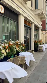 A cinematic montage showcasing the interior and tasting menu experience at Trèsind in Mayfair. The video features slow, deliberate shots of the restaurant's decor, the preparation of elaborate dishes, and the final presentation of various courses, emphasizing the fine dining atmosphere.