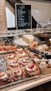 A short, effective tour of a bakery in Bedfordshire, highlighting the interior and the variety of baked goods and light meals available.