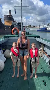 A family-focused vlog documenting a visit to the Portsmouth Historic Quarter, featuring a landing craft boat experience followed by a lunch at Boathouse 4 Kitchen.