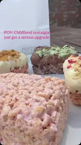 A creator and a child review indulgent, gourmet rice crispy treats from a new pop-up business called Krisp, showcasing various flavors like mint chocolate, biscoff, and strawberry cheesecake.