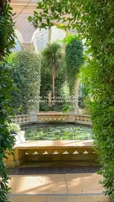 A montage of aesthetic shots featuring the orangery and gardens at Castle Ashby, showcasing the peaceful and historic atmosphere of the location.