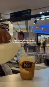 A short, edited montage showcasing the preparation of an açai bowl and a coffee at a cafe called Vyve.