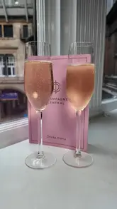 A montage showcasing the interior and afternoon tea service at Champagne Central, a bar located within a hotel.