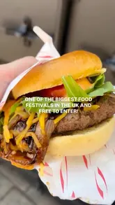 A fast-paced vlog-style reel capturing a visit to the Bolton Food Festival. The creator samples a wide variety of street food, including burgers, corn dogs, pulled pork wraps, ice cream, churros, and rice bowls, while highlighting the lively festival atmosphere and entertainment.