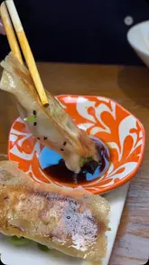 A montage-style video showcasing various dishes at Murger Han, including handmade noodles, dumplings, a toasted duck murger, and desserts, highlighting the authentic Xi'an cuisine and the restaurant's atmosphere.