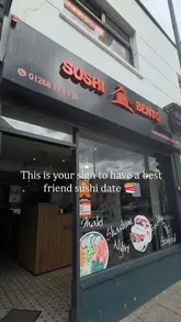 A short promotional video showcasing a visit to Sushi & Bento House in Rayleigh, highlighting the food selection including sushi, bao buns, and gyoza, while mentioning a discount code.