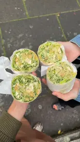 A short, punchy video showcasing the preparation and consumption of a viral Chicken Caesar wrap at CZER in Soho, London.