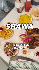A short montage showcasing a variety of Lebanese dishes from Shawa at Westfield London, including rotisserie chicken, shawarma, fries, and drinks.