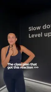 A video showcasing a Pilates reformer class, featuring the instructor demonstrating various exercises on the machines in a modern studio setting.
