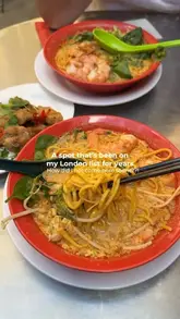 A short, fast-paced video showcasing the food and outdoor seating area of Phât Phúc Noodle Bar in Chelsea, featuring close-ups of laksa and salt & pepper wings.