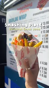 A short, punchy reel showcasing Greek street food items like gyros, halloumi fries, and a mezze box from Smashing Plates at a food festival.