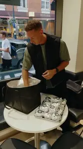 A recap video of an in-store event at the Represent clothing store in London, featuring food, drinks, a tattoo artist, and screen printing.