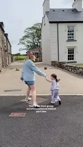 A family vlog showcasing a stay at Oh So Stays in Portrush, Ireland, highlighting the accommodation's amenities like the hot tub and fire pit, as well as local activities like visiting the beach and a funfair.