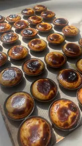 A video showcasing a Pastel de Nata masterclass at Santa Nata in Battersea, detailing the process from scratch to the final product.