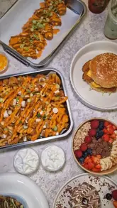 A promotional reel for Chocalatte in Loughborough, featuring a variety of their menu items including chicken tenders, burgers, loaded fries, drinks, and desserts. The creator showcases the interior of the cafe and highlights the food offerings.