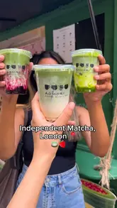 A short, fast-paced video showcasing a small, independent matcha shop in London. The creator displays various matcha-based drinks and soft serve ice cream, highlighting the menu and the shop's exterior.