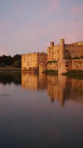 A montage video showcasing an overnight stay at Leeds Castle, highlighting the historic architecture, the bedroom interiors, and the scenic castle grounds.