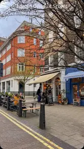 A short, aesthetic video tour of Lamb's Conduit Street in London, highlighting its independent shops, cafes, and quiet, village-like atmosphere away from the city's main roads.