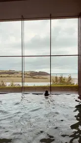 A family travel vlog showcasing a stay at Dylan Coastal Resort in Wales, featuring scenic views, pool time, and family moments.