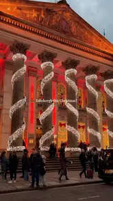 A fast-paced, festive montage showcasing various iconic locations and hospitality spots in Edinburgh during the Christmas season, including coffee shops, the Christmas market, and historic landmarks.