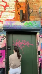 A short video showcasing Little Hardware, a hidden, tool-themed speakeasy in Liverpool. The video follows a person entering the venue through a graffiti-covered door and a narrow hallway, revealing the interior, the cocktail menu, and several drinks.