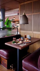 A high-quality, aesthetic video showcasing the interior, riverside views, and breakfast menu at Coppa Club London Bridge. The footage features smooth pans of the dining area and close-ups of brunch dishes like poached eggs with salmon, french toast, and coffee.