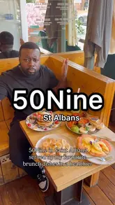 A creator visits 50Nine in St Albans to review their healthy brunch menu, showcasing dishes like protein pancakes, salmon eggs benedict, and a full English breakfast, while highlighting the cafe's warm ambiance and open kitchen.