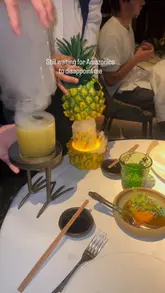 A high-quality montage showcasing the dining experience at Amazónico, featuring a variety of dishes, cocktails, live music, and the venue's distinctive jungle-themed interior.
