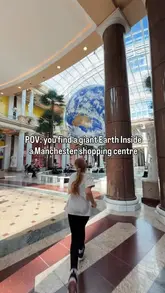 A short video showcasing the 'Gaia' art installation, a giant floating Earth, located inside the Trafford Palazzo shopping centre in Manchester.
