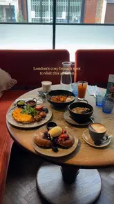 A short, polished montage showcasing the brunch menu and interior of the Riding House Cafe in Fitzrovia, London.