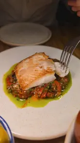 A montage of food and drink dishes at Pip in Manchester, featuring crispy mushrooms, pan-roasted halibut, pesto trofie pasta, and steak frites.