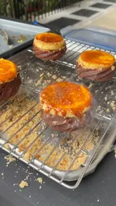 A montage showcasing the preparation and serving of unique cruller pastries at a market stall, featuring various toppings like crème brûlée, pistachio, and blackberry jam.