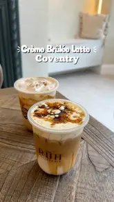 A short, aesthetic video showcasing two iced lattes and a selection of pastries at Rüh Pâtisserie in Coventry. The video features close-up shots of the drinks and the display case, with text overlays identifying the items.