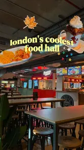 A creator visits Tower Bridge Collective, a food hall in London, highlighting the variety of 13 different food vendors and showcasing a selection of dishes including tacos, pizza, and a signature hot chocolate with a toasted marshmallow topping.