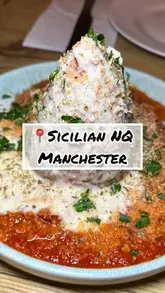A fast-paced, engaging food review vlog featuring a visit to Sicilian NQ in Manchester, showcasing a variety of authentic Italian dishes including arancini, pasta, and desserts, with a focus on their extensive vegan options.
