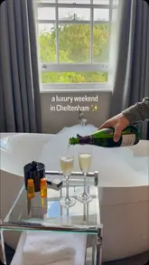 A montage video showcasing a luxury weekend stay at Malmaison Cheltenham, featuring the hotel room, amenities like the freestanding bath, and various dining experiences including dinner, afternoon tea, and a Sunday roast.
