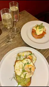 A short, punchy video showcasing a bottomless brunch experience at Pivot Bar & Bistro in Covent Garden, featuring shots of the menu, cocktails, and brunch dishes.