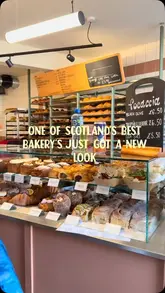 A short, handheld video tour showcasing the new interior and pastry display of a bakery in Scotland.