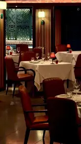 A polished, cinematic montage showcasing the tasting menu and elegant interior of Benares, a Michelin-starred Indian restaurant in Mayfair. The video features close-up shots of intricate dishes, signature cocktails, and the sophisticated dining atmosphere.