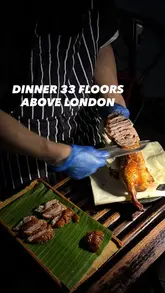 A short, visually appealing reel showcasing a dinner experience at Hutong in The Shard, London. The video features sweeping shots of the sunset view over London, the restaurant's interior, cocktails, and various dishes including Peking duck and dim sum.