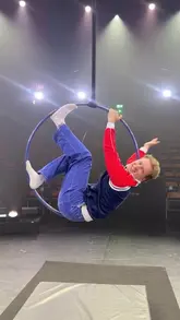 A creator visits The Come Alive Show in London, attempting to learn juggling and aerial acrobatics, showcasing the circus-themed entertainment experience.