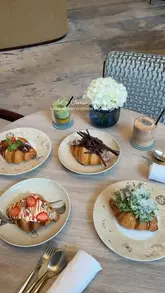 A polished showcase of the 'La Croissanterie' experience at the Four Seasons London, featuring elevated sweet and savory croissant creations by Chef Yannick Alléno.